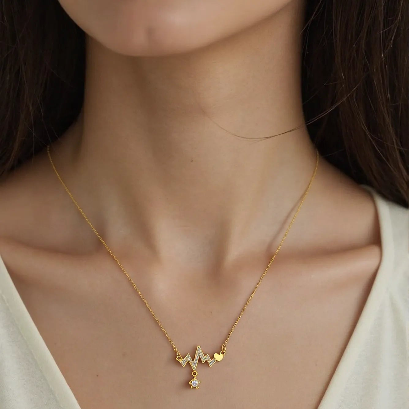 Golden Heartbeat Pendant Necklace