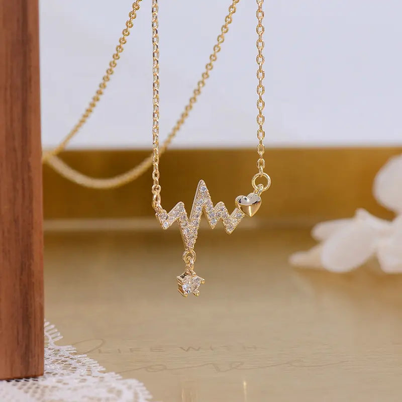 Golden Heartbeat Pendant Necklace