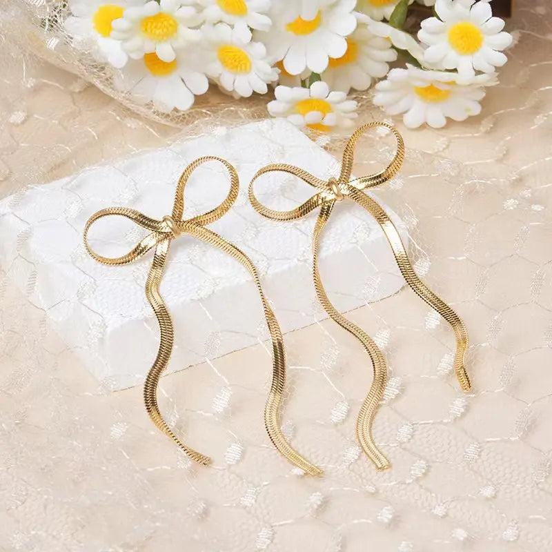 Golden Stream Bow Earrings
