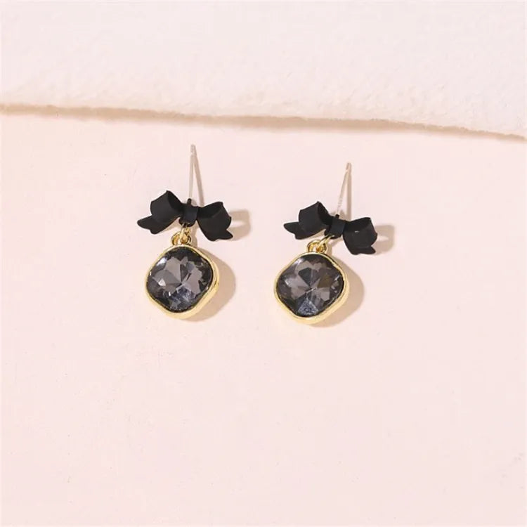 Midnight reflections Bows earrings