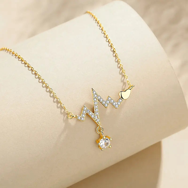 Golden Heartbeat Pendant Necklace