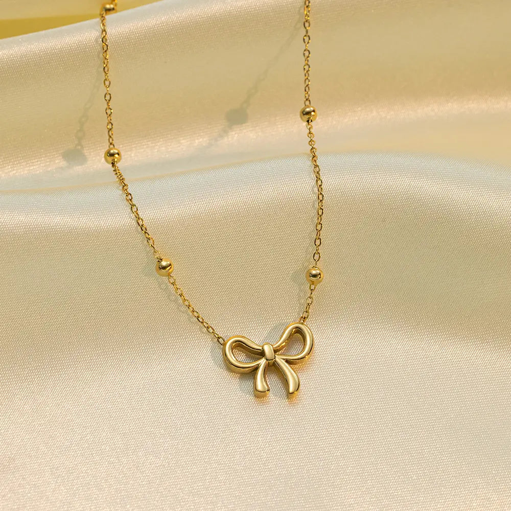 Golden Bow Belle Necklace