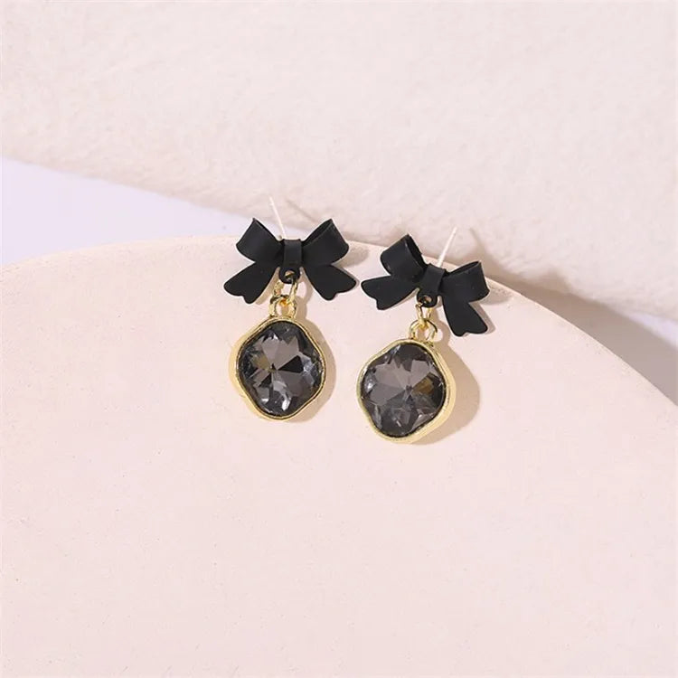 Midnight reflections Bows earrings
