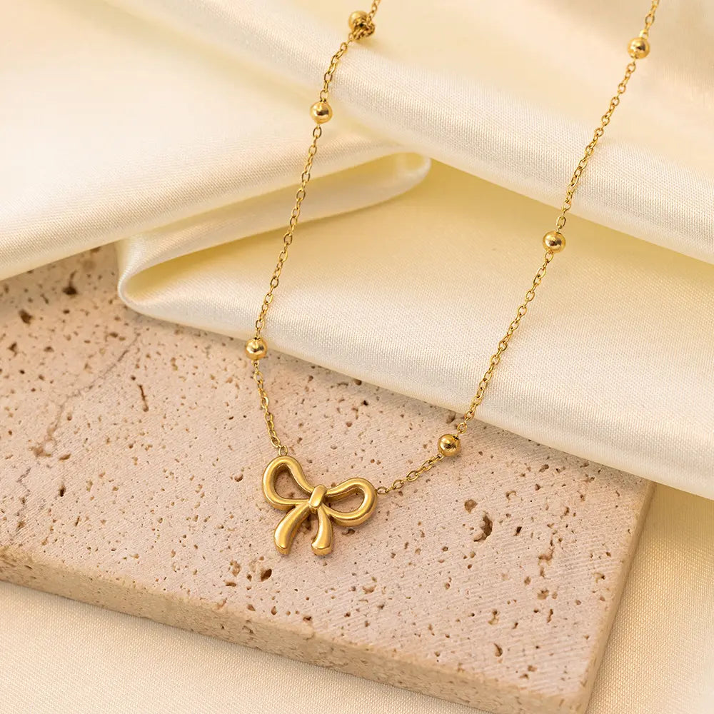 Golden Bow Belle Necklace