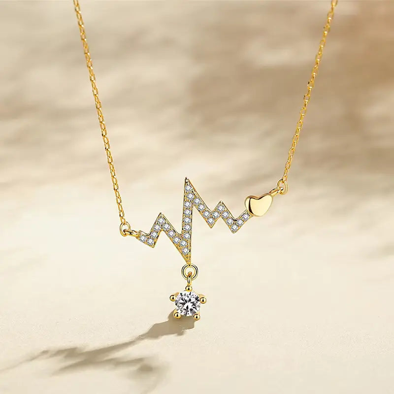 Golden Heartbeat Pendant Necklace