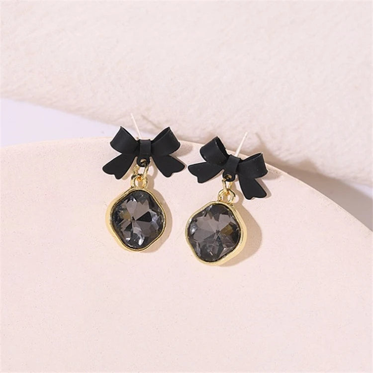 Midnight reflections Bows earrings