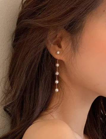 Elegance linear Pearl drops earrings