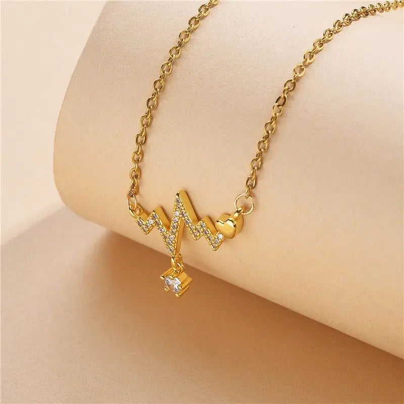 Golden Heartbeat Pendant Necklace