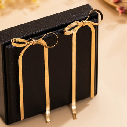 Golden Stream Bow Earrings