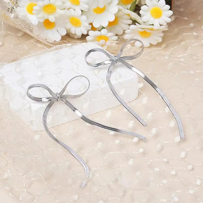 Golden Stream Bow Earrings