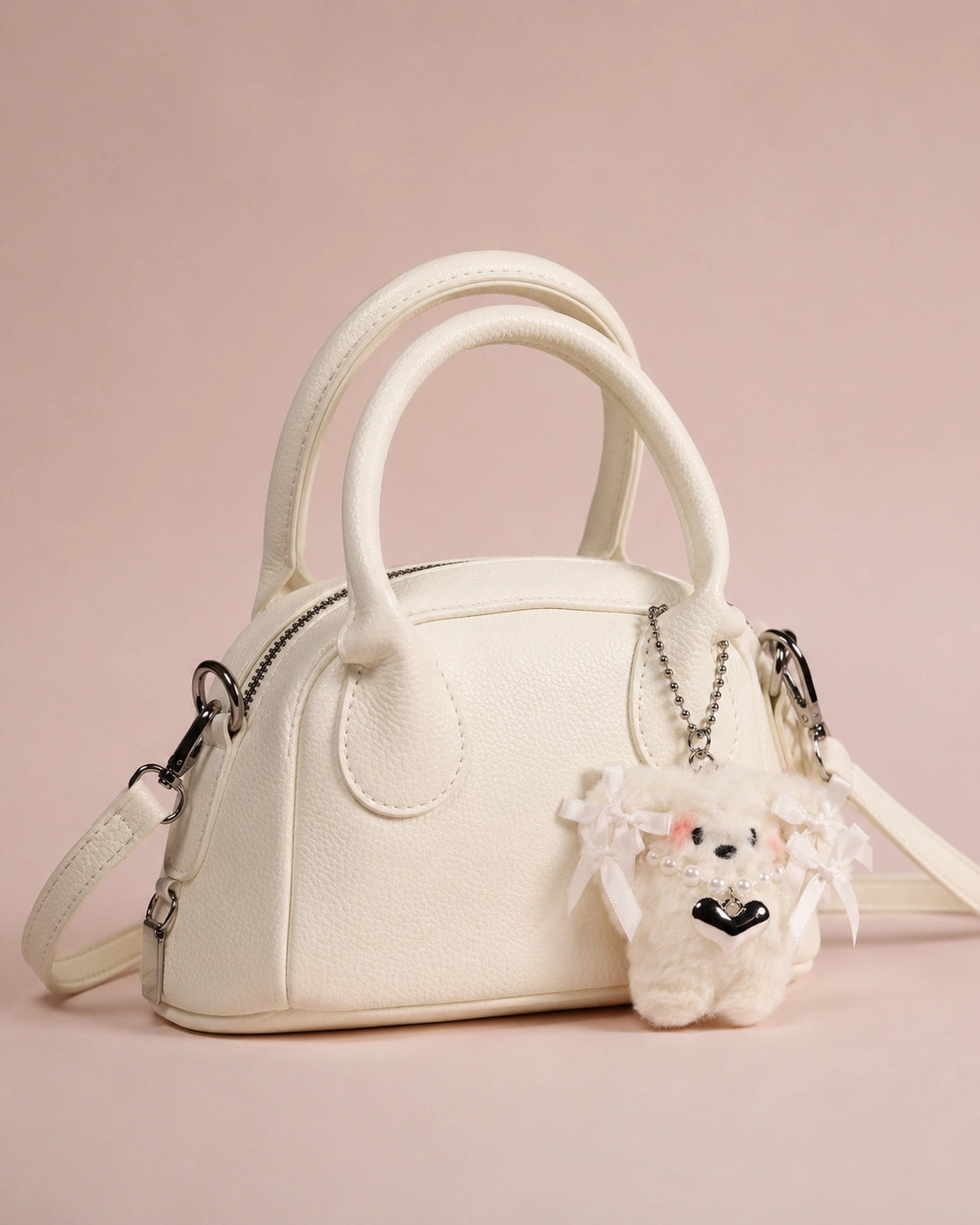Ivory Charm Hand Bag