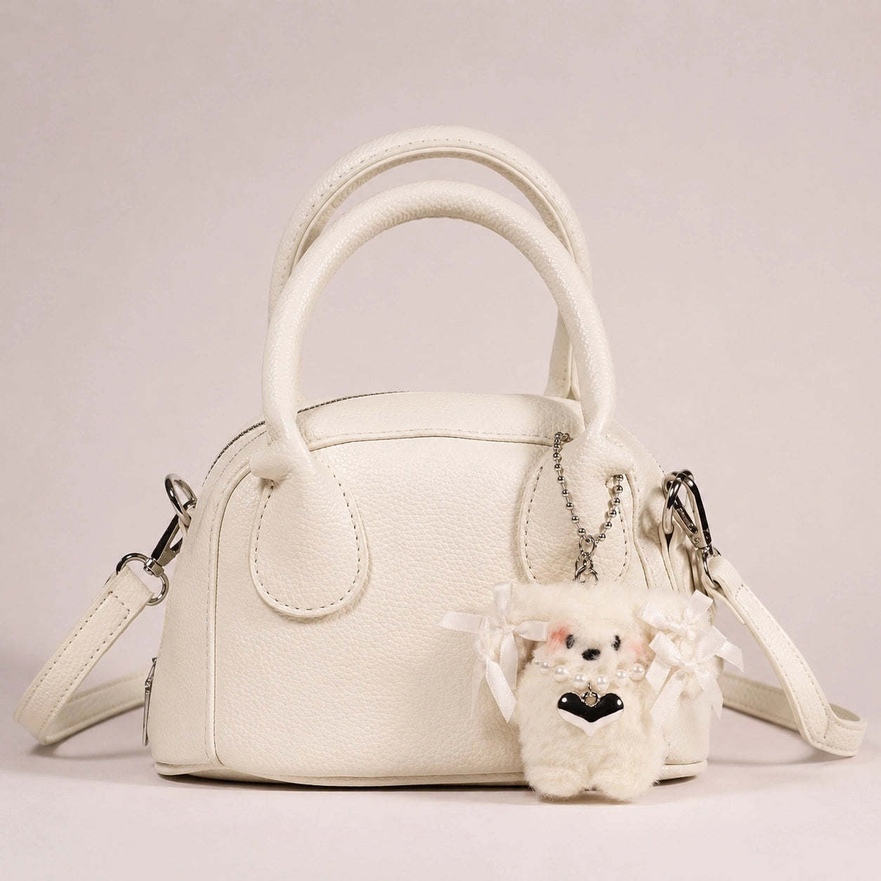 Ivory Charm Hand Bag