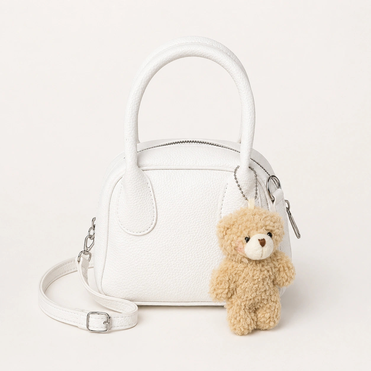 Ivory Charm Hand Bag