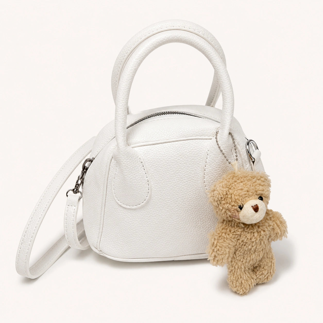 Ivory Charm Hand Bag